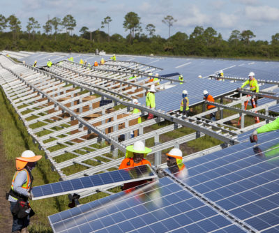 Workers install panels last year at the&nbsp;Babcock Solar Energy project&nbsp;in Punta Gorda, Florida. The project is&nbsp;one of eight new utility-scale solar farms&nbsp;in the state set&nbsp;to be completed by early 2018.&nbsp;