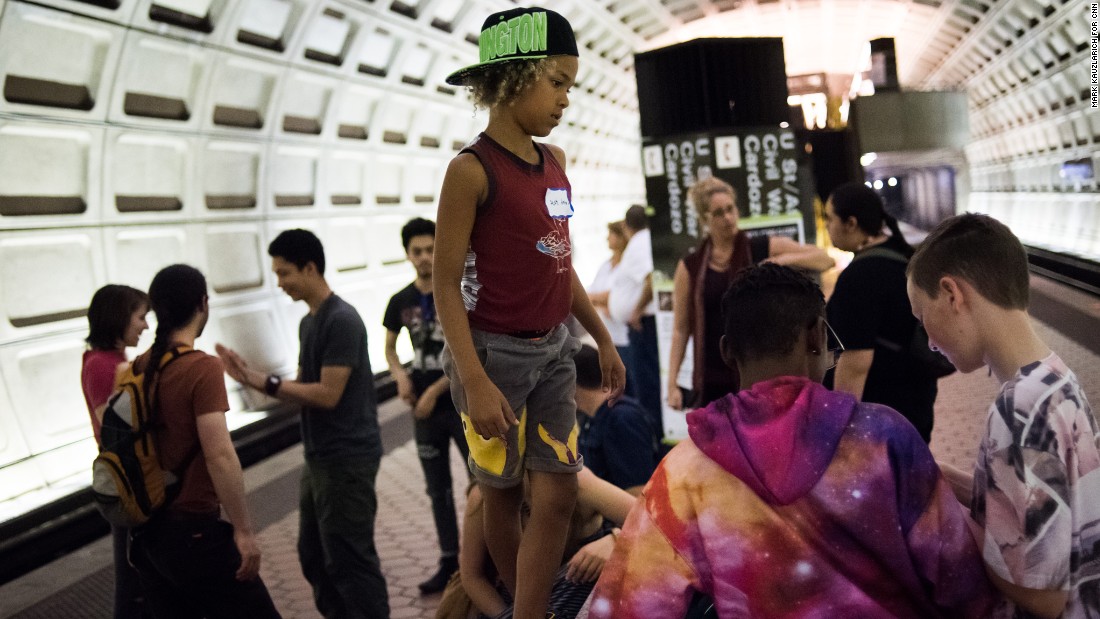 Kids suing Trump at DC Metro station