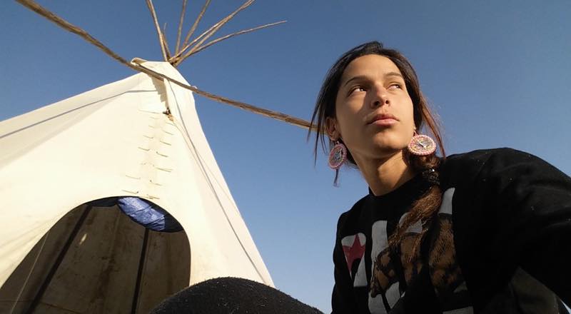 Jade Kalikolehuaokukalani Wool, detained at the same time as Jenni Monet.