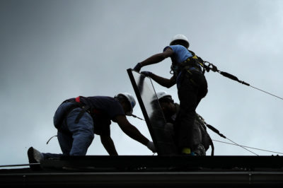 Workers in Washington, D.C., install the one millionth solar panel in May, 2016.