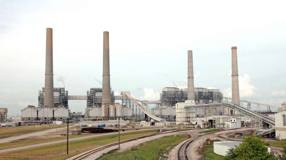 NRG Energy is outfitting its W.A. Parish power plant in Fort Bend County with new infrastructure to capture carbon dioxide from coal burned in one of the plant s generators instead of releasing it into the atmosphere. The new facility will pipe the greenhouse gas to an oil field for use underground in enhanced oil recovery. (NRG Energy photo) Photo: NRG Energy