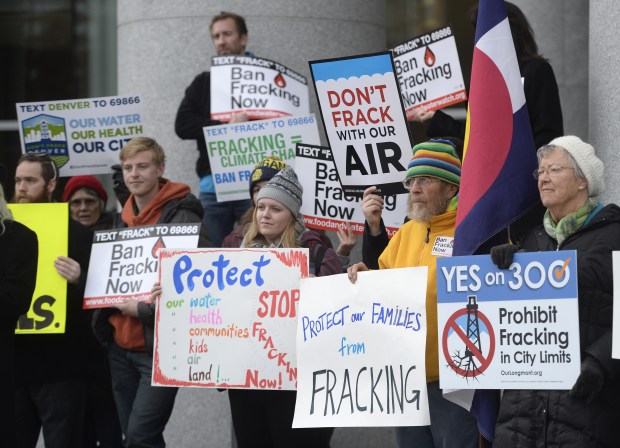 Protesters gather in front of the Colorado Supreme Court before hearings on local governments and fracking on Dec. 9, 2015.