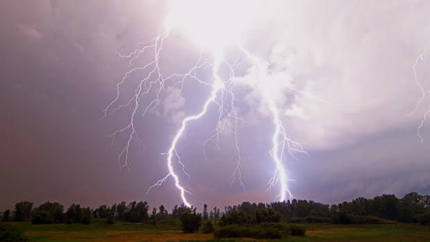 Striking Photos Show Lightning, Flooding in July 12 Storms