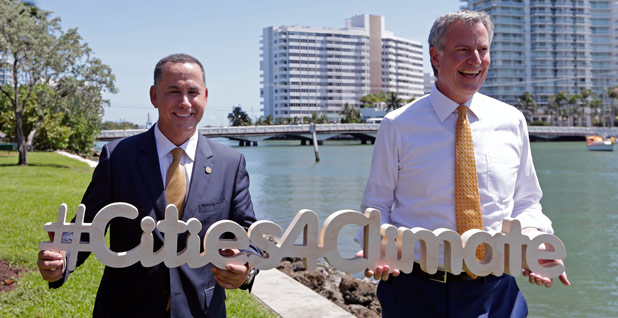 Miami Beach Mayor Philip Levine and New York City Mayor Bill de Blasio. Photo: Alan Diaz/AP Images 