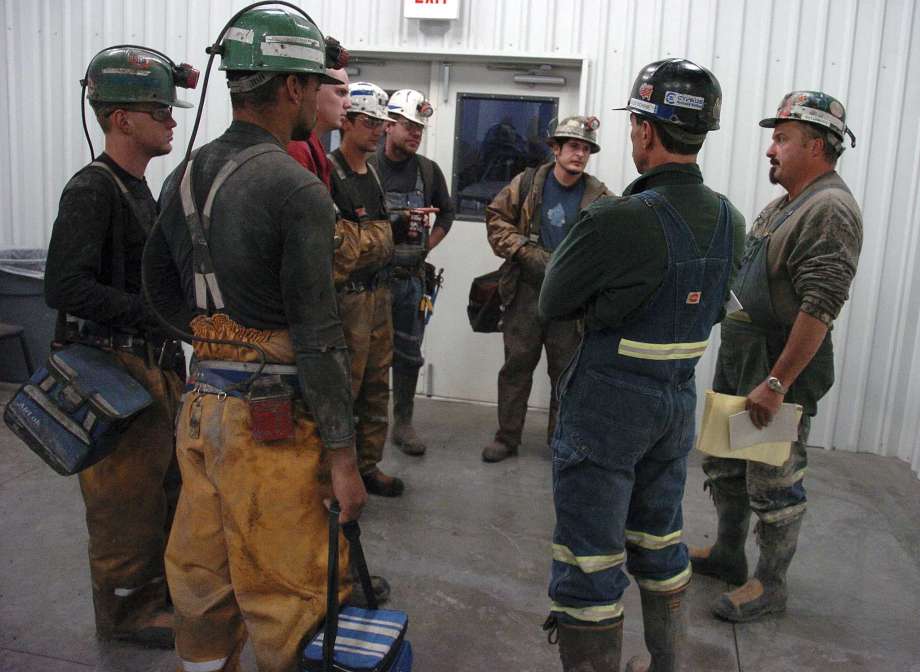 FILE - In this Aug. 28, 2009, file photo, coal miners receive a safety briefing at Signal Peak Energy's Bull Mountain coal mine near Roundup, Mont. A judge has blocked a proposed 176-million ton expansion of the mine because federal officials did not consider its climate change impacts. Photo: Matthew Brown, AP / Copyright 2017 The Associated Press. All rights reserved.