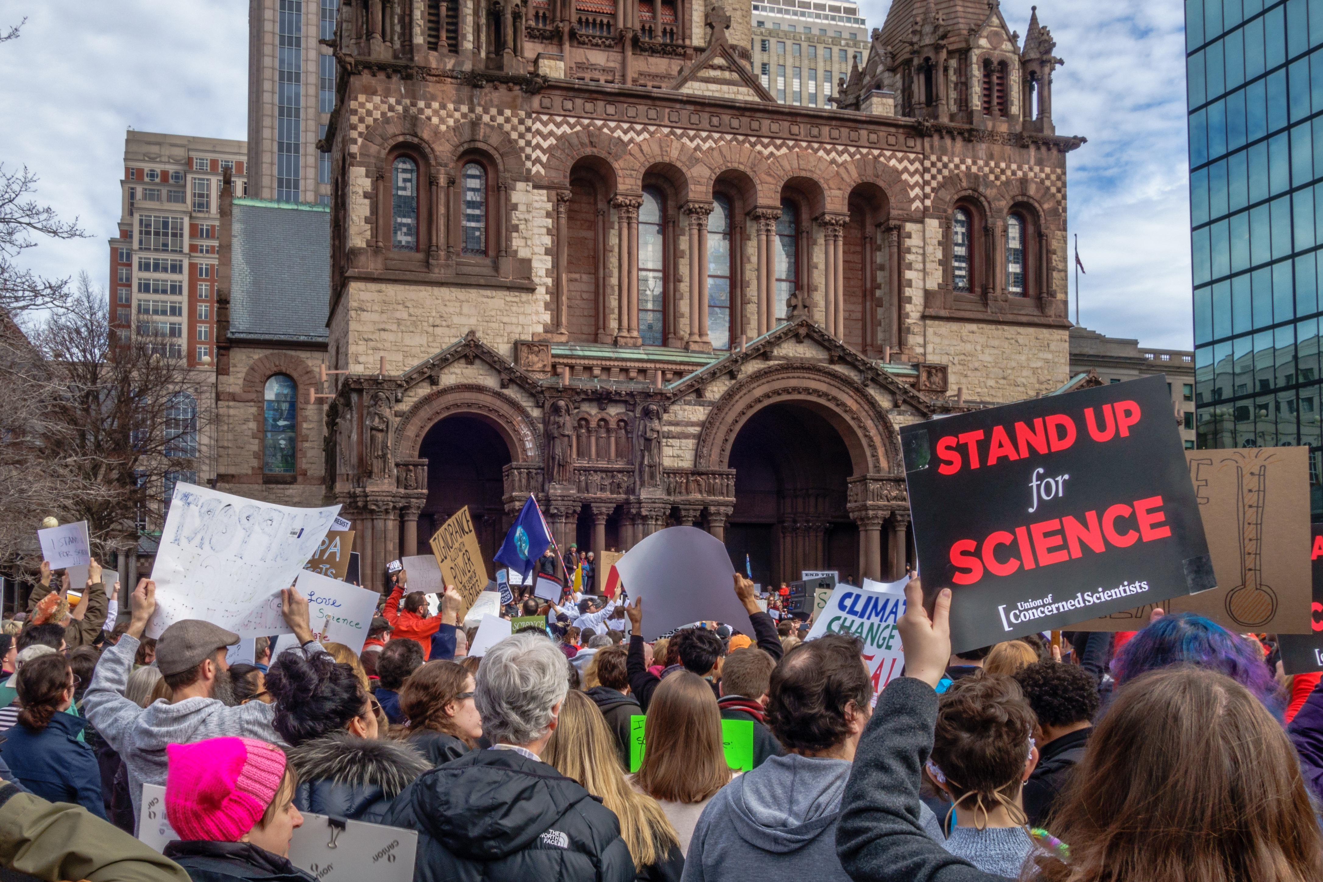 BOSTON, MA USA - FEBRUARY 19, 2017: Protesters hold up signs at the Stand Up for Science Rally in Copley Square Boston.