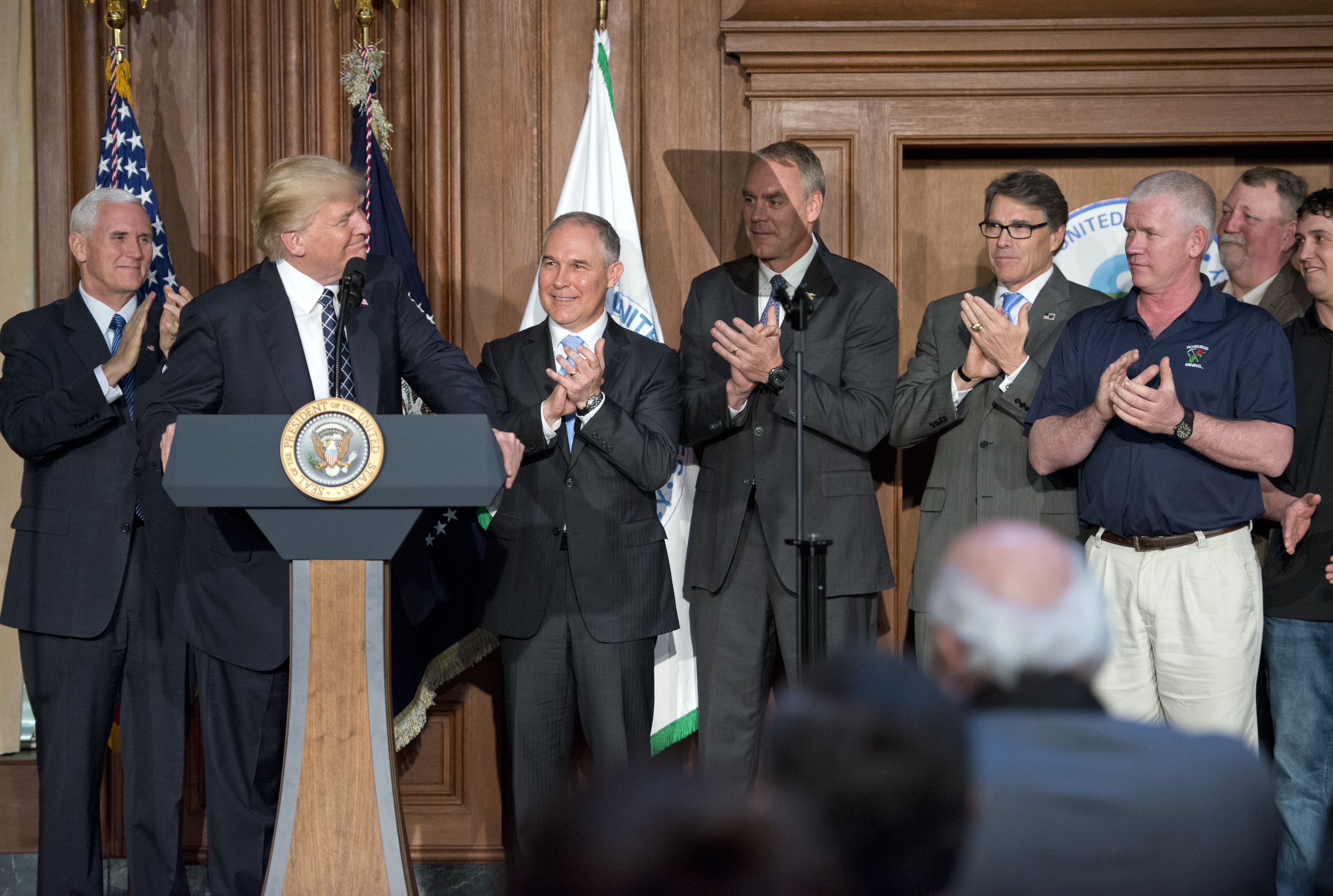 WASHINGTON, DC - MARCH 28: US President Donald Trump makes remarks prior to signing an Energy Independence Executive Order at the Environmental Protection Agency (EPA) Headquarters on March 28, 2017 in Washington, DC. The order reverses the Obama-era clim