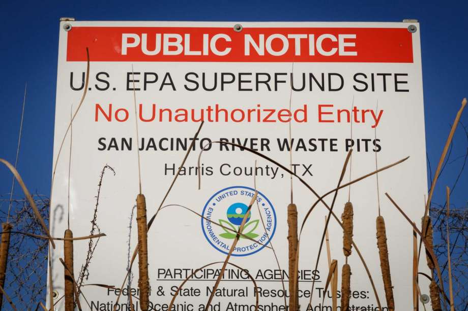 A sign warns the public about the EPA Superfund Site not to eat contaminated seafood caught from the water along Interstate 10 near the San Jacinto River east of Houston in Channelview. (Houston Chronicle file photo) Photo: Michael Paulsen, Staff / © 2013 Houston Chronicle