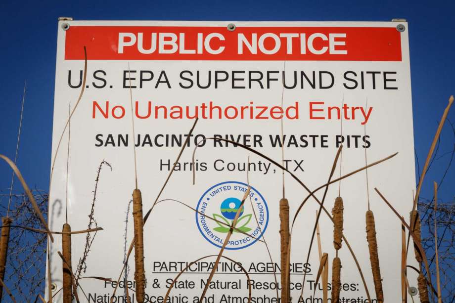 A sign warns the public about the EPA Superfund Site not to eat contaminated seafood caught from the water along Interstate 10 near the San Jacinto River east of Houston in Channelview. (Houston Chronicle file photo) Photo: Michael Paulsen, Staff / &copy; 2013 Houston Chronicle
