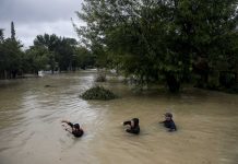 After hurricanes, climate change resurfaces in Washington.