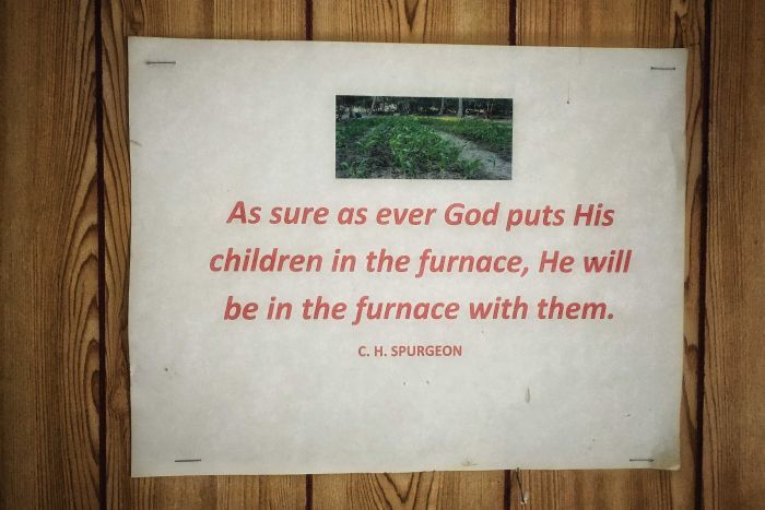 A Charles Spurgeon quote stapled to a wall on Enewetak Island says God will be "in the furnace" with his "children".