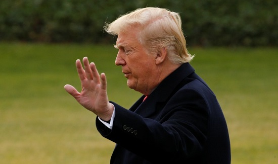 President Trump raises his hand toward a camera. President Trump departs for holiday travel to his Mar-a-Lago estate on Dec 22