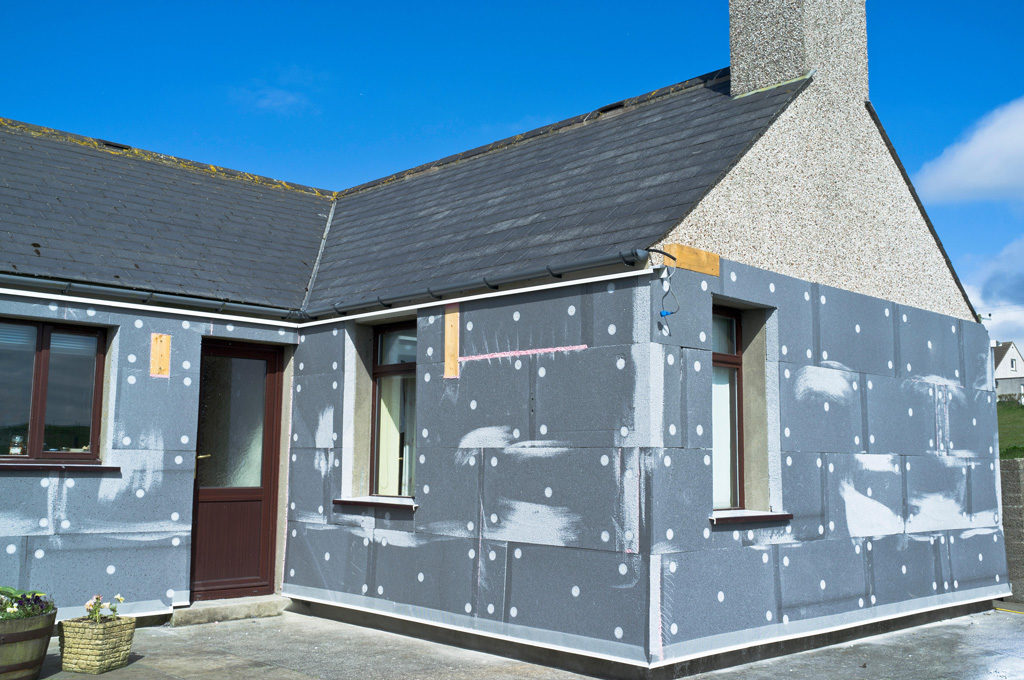 Wall insulation attached to external walls of bungalow
