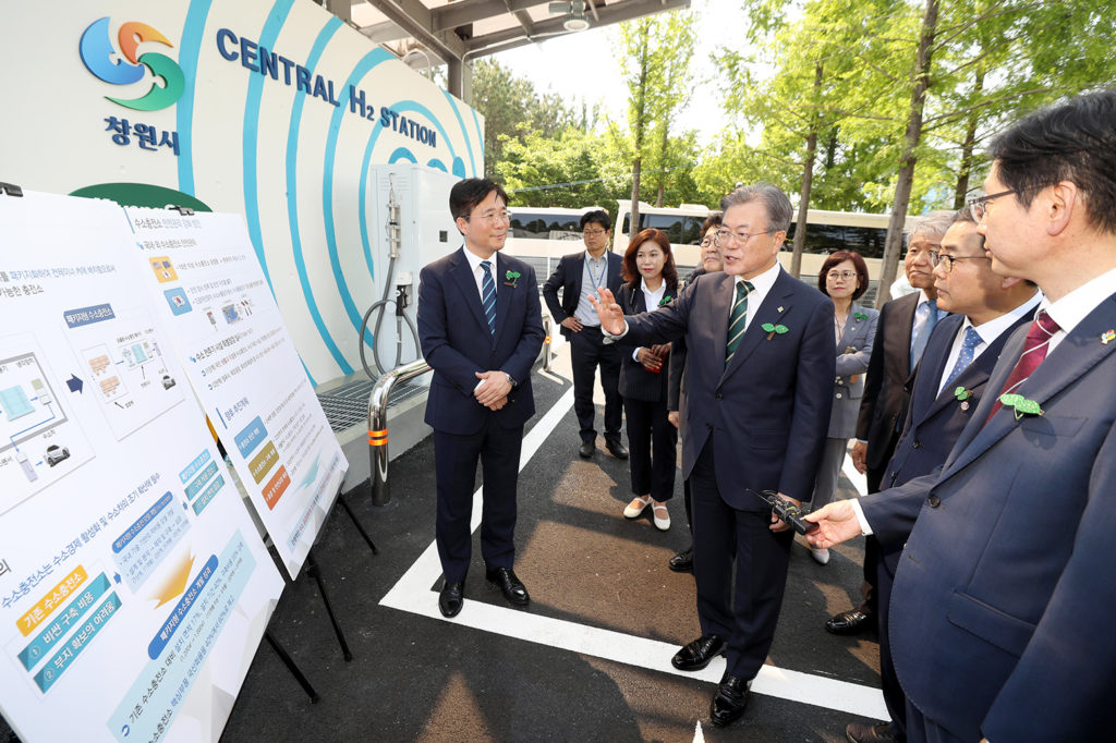 South Korean president Moon Jae-in is briefed on a hydrogen charging station in Changwon on 5 June 2019. Credit: Newscom / Alamy Stock Photo. TC312C