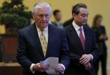 Massachusetts adds to call for Tillerson's alias emails in Exxon climate probe.