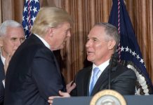 Trump's Justice Dept. asks court to halt Clean Power Plan case.