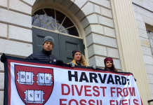 Harvard students blockade entrance in divestment protest.