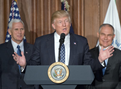 President Trump at EPA headquarters prior to signing an executive order rolling back U.S. climate change commitments. He is flanked by EPA Administrator Scott Pruitt (right) and Vice President Mike Pence.&nbsp; 