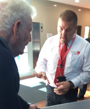 Mr Ryan speaks to security staff at Downer's Sydney office on Tuesday.