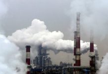 Top economists: Carbon price above 40 dollars needed to meet Paris climate goal.