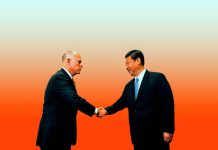 An American leader is in China right now signing all these climate deals. It is obviously not Trump.