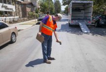 As LA heat wave bakes Valley, residents say ‘cool pavement’ project is working.