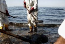 Greece struggles to mop up oil spill; critics demand more.