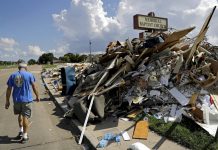 Trump voters in storm-ravaged county confront climate change.