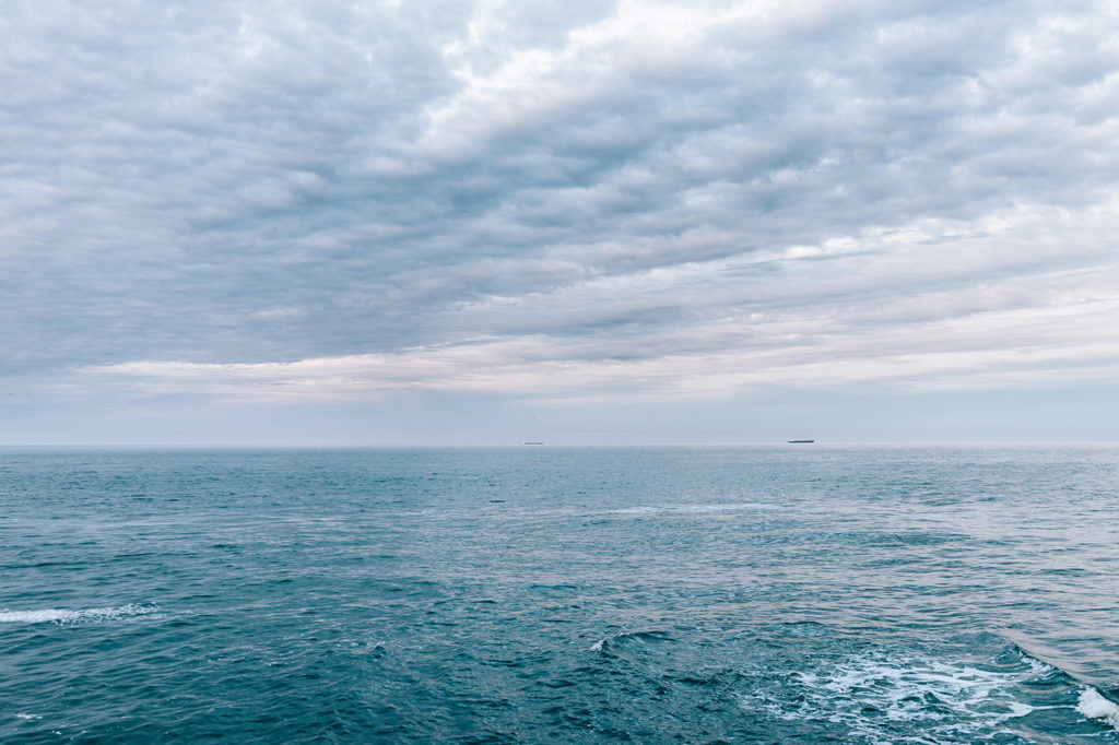 Sea landscape with overcast stratocumulus clouds. Credit: progressman / Alamy Stock Photo. MDWT9P